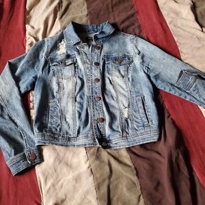 Distressed denim jacket